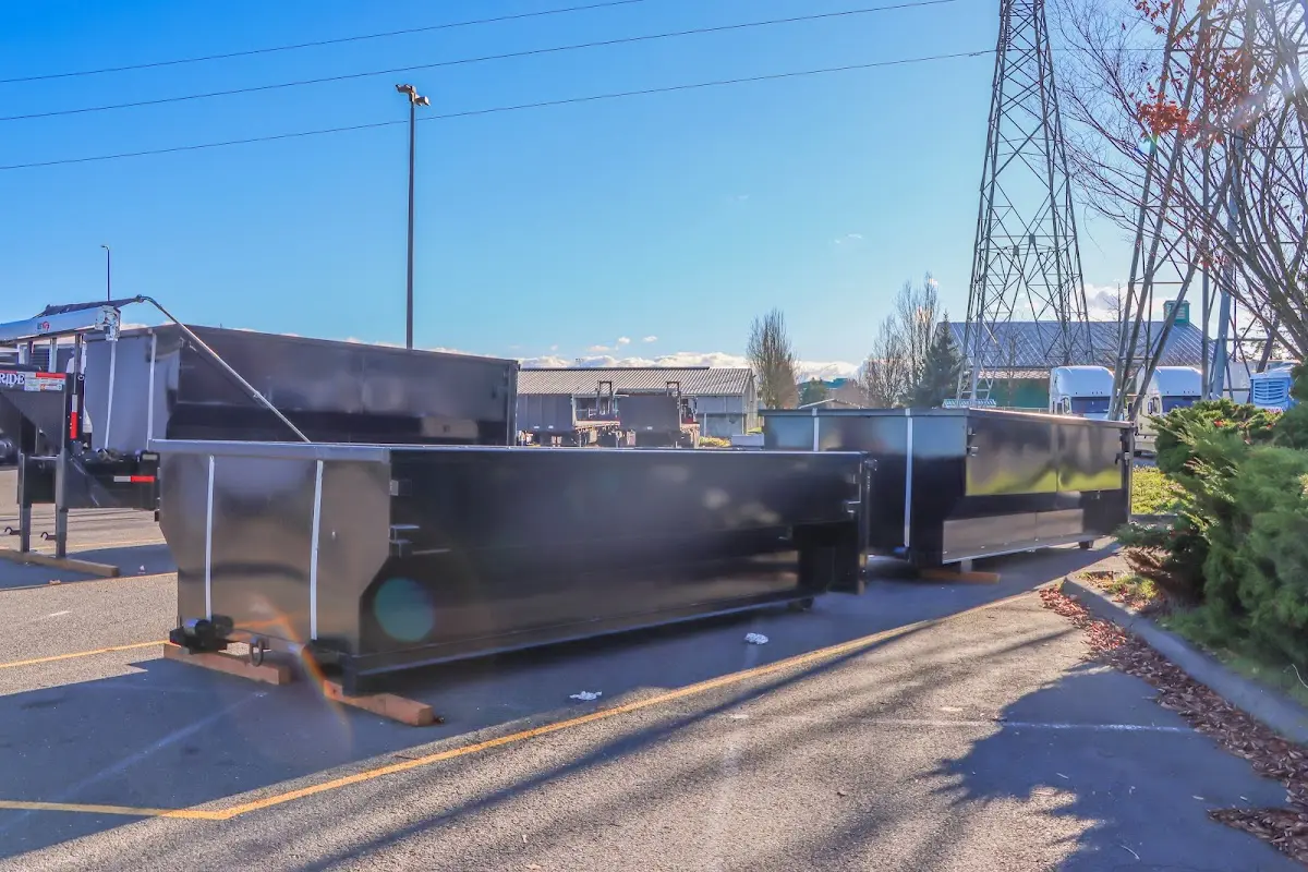 Roll-off dumpster ready for waste disposal at job site for Yard Waste Dumpster Rental in Woodfield